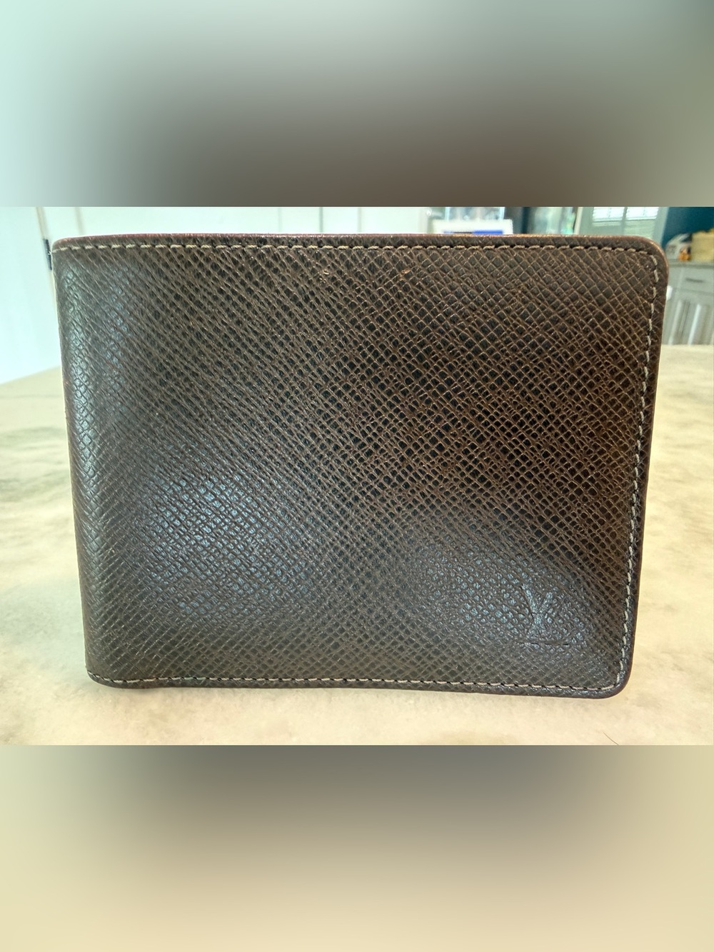 Louis Vuitton Men’s Slender Bifold Wallet in Brown Taiga Leather